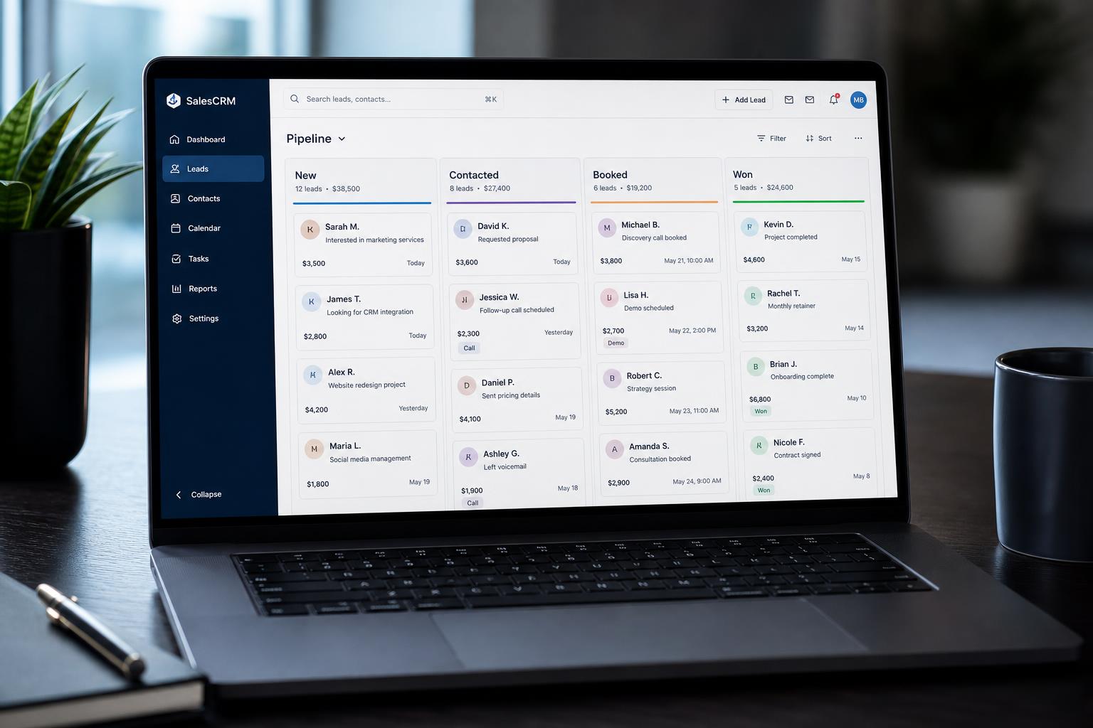 Laptop showing a CRM pipeline dashboard with leads moving through stages